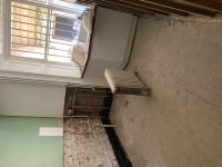 1. Walls are stripped back in the basement area...