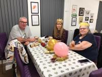 Saturday, 3 December 2022: Ewan Irvine discusses tactics with Caroline and Mary Waterston...