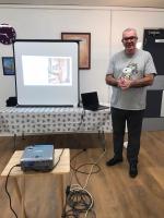 ...then gives an interesting talk on ghosts and haunted houses